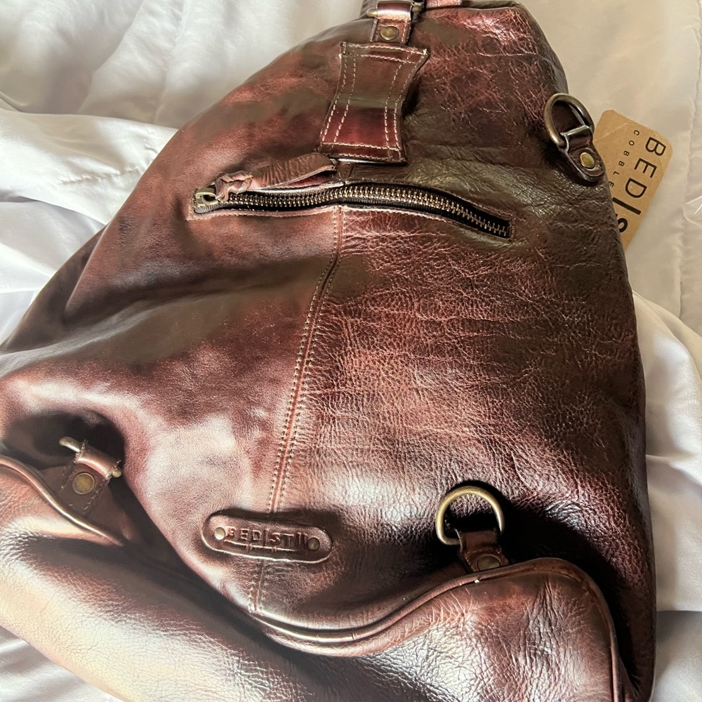 Bed Stu Delta in teak rustic. NWT and original packing. Retails for $345